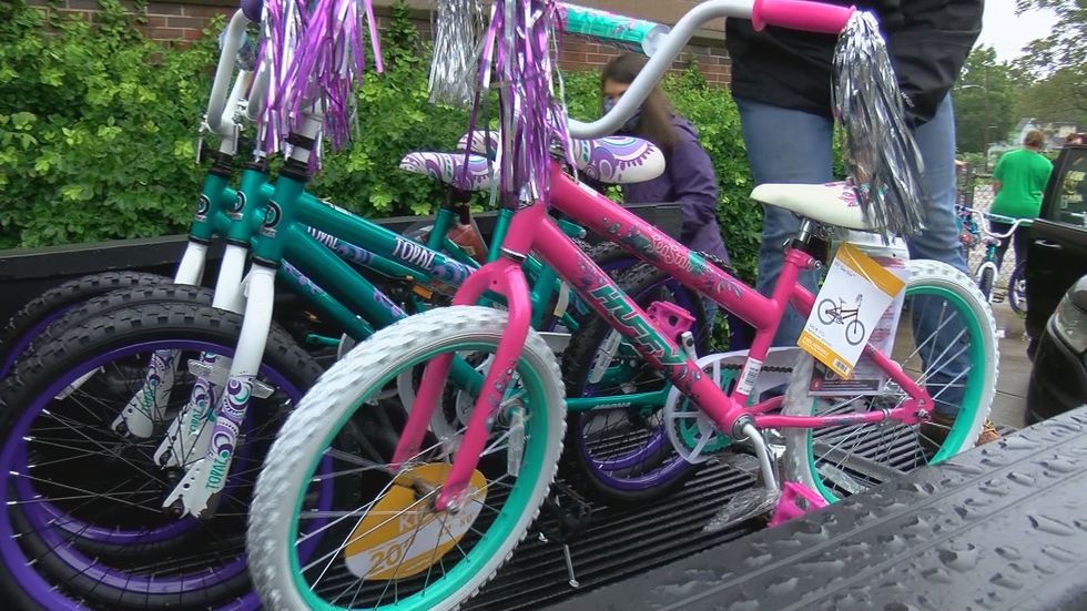 First grade teachers at Byck Elementary collected bikes, helmets, food and summer toys along...