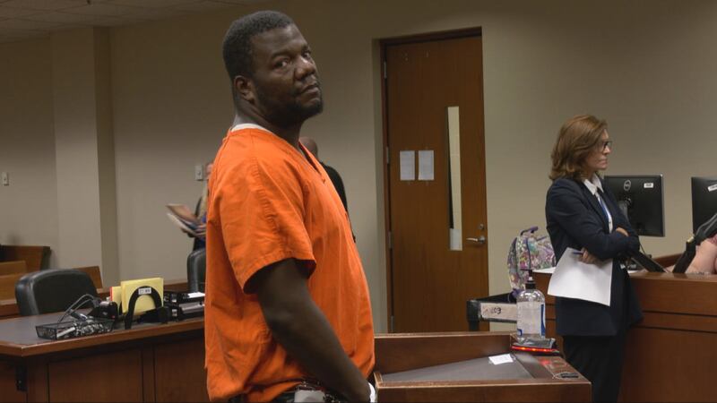 Arthur Simson stands before a judge.