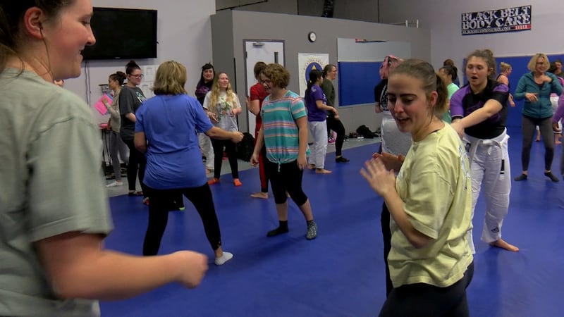 Women Empowered group teaching women life-saving defense techniques