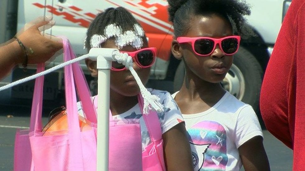 Pink sunglasses were on display Saturday afternoon. (Source: WAVE 3 News)