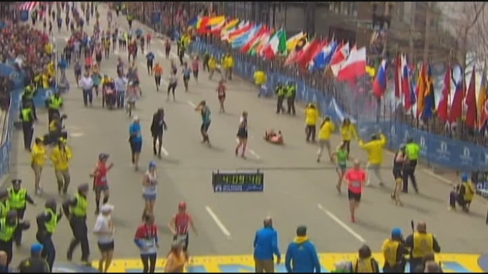 The scene along Boylston Street following the detonation of the first bomb near the Boston...