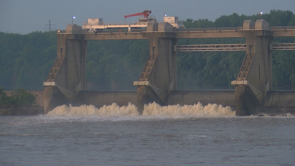 One of the men was swept through the gates of the McAlpine Dam before crews could rescue him....