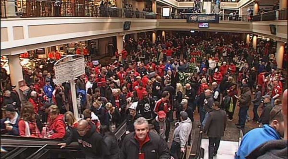 Cardinal fans fill Lexington Center as the wait for the Rupp Arena doors to open.