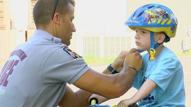 The event helped teach kids about bike safety, including wearing a helmet. (Source: WAVE 3 News)