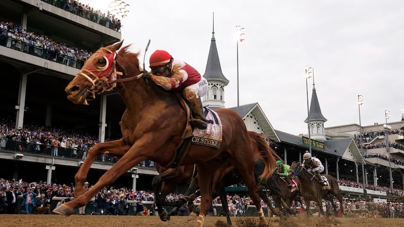 FILE -Rich Strike (21), with Sonny Leon aboard, wins the 148th running of the Kentucky Derby...