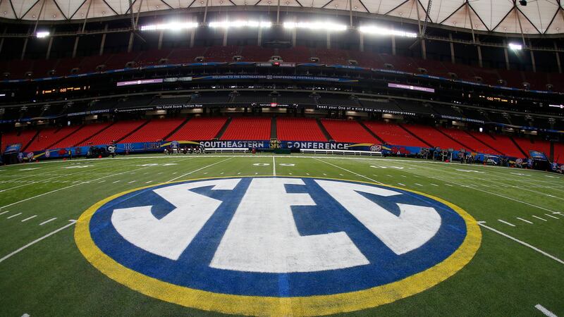 FILE - The SEC logo is displayed on the field ahead of the Southeastern Conference...