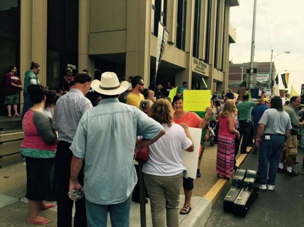 Protesters on both sides of the same-sex marriage debate gathered outside the federal...