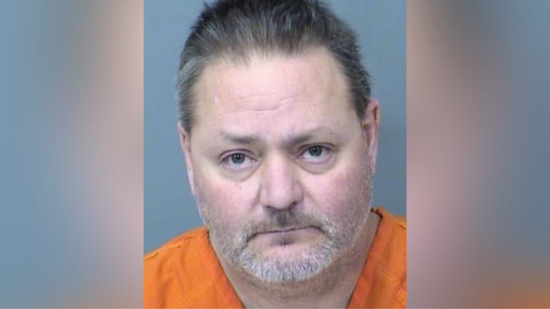 Timothy Staufenbeil, 48, is accused of shooting his girlfriend in the back of the head in...