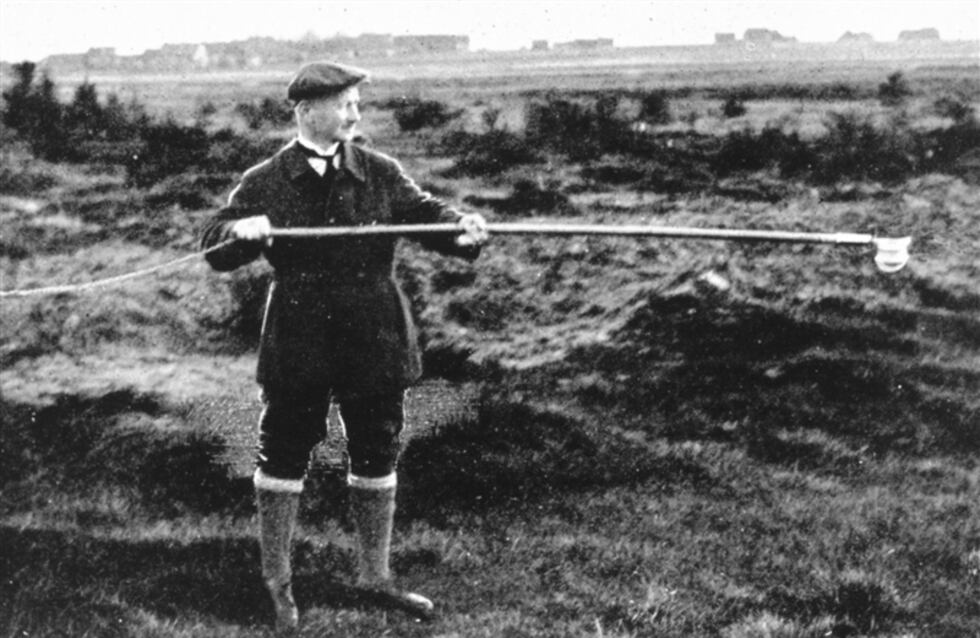 This photo shows a man using an Angstrom pyranometer to measure albedo circa 1930.