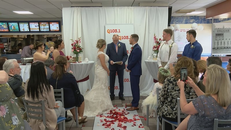 The couple, family and friends gather at White Castle for the ceremony.