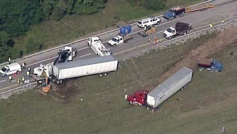 Wreckers on the scene to remove the vehicles involved.