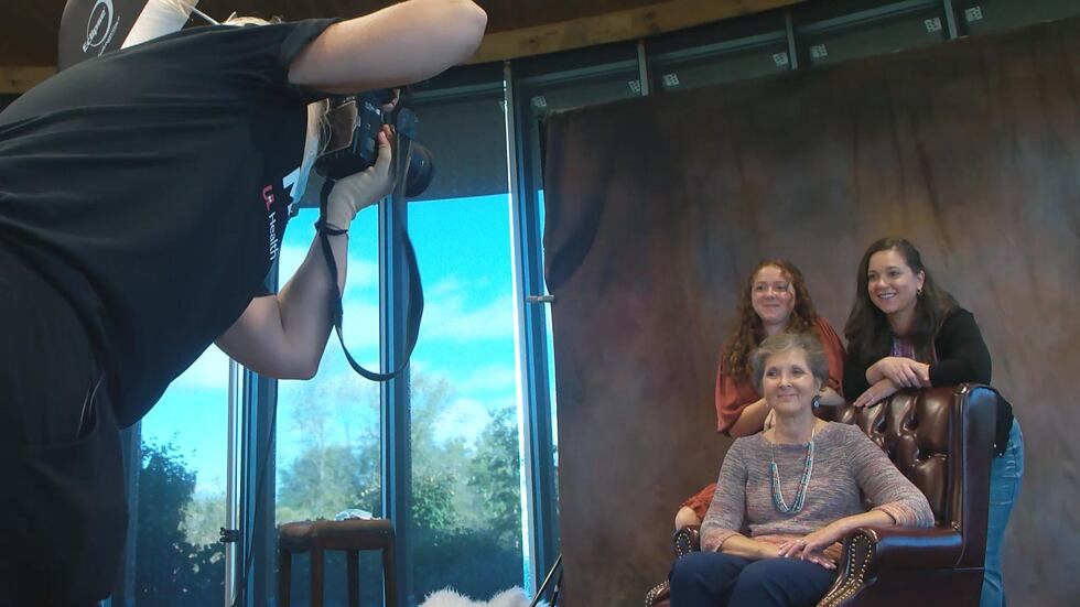 Joined by her granddaughter and her daughter, Cathy Kennedy had a photo taken of three...