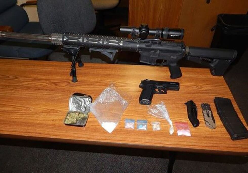 Drugs and several firearms were recovered during the vehicle search. (Source: ISP)