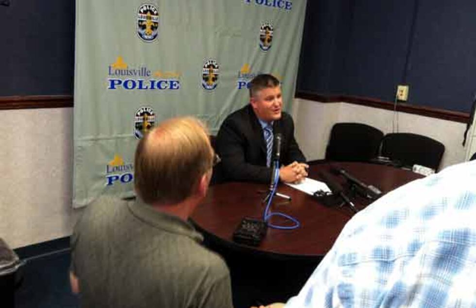 Sgt. Aaron Crowell addresses the media