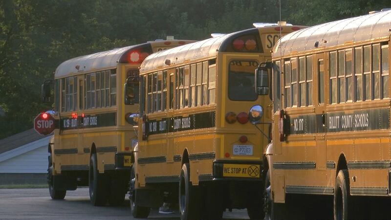 Bullitt County school buses line up outside Hebron Middle School on the first day of class 2021.