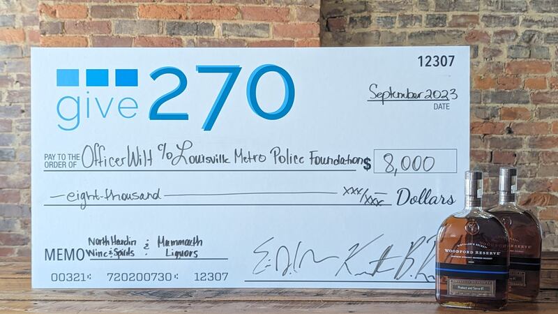 Give 270 donates $8,000 to family of Officer Nick Wilt.