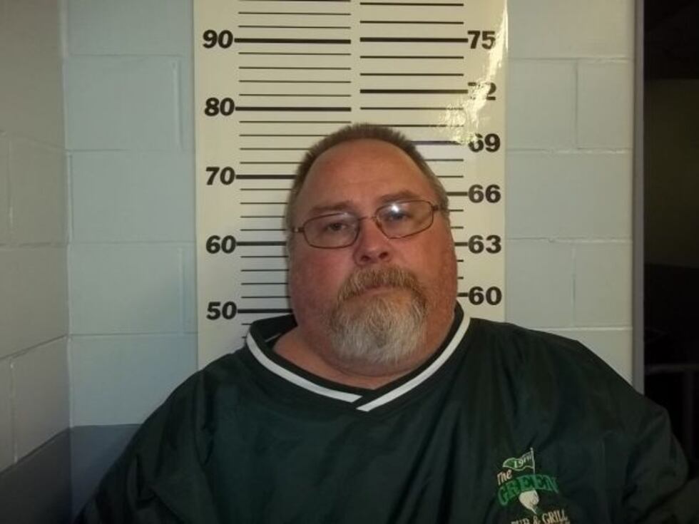 Kevin Hennegan, 56, was arrested Friday at Charlestown Middle School (Charlestown Police...