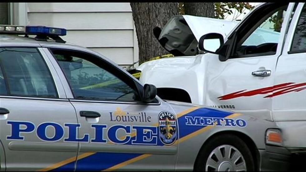 The police cruiser and the white truck.