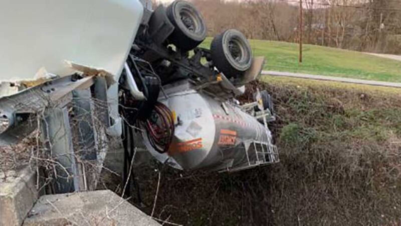 A truck pulling a tanker with flammable liquid went off a bridge in Whitley County spilling...